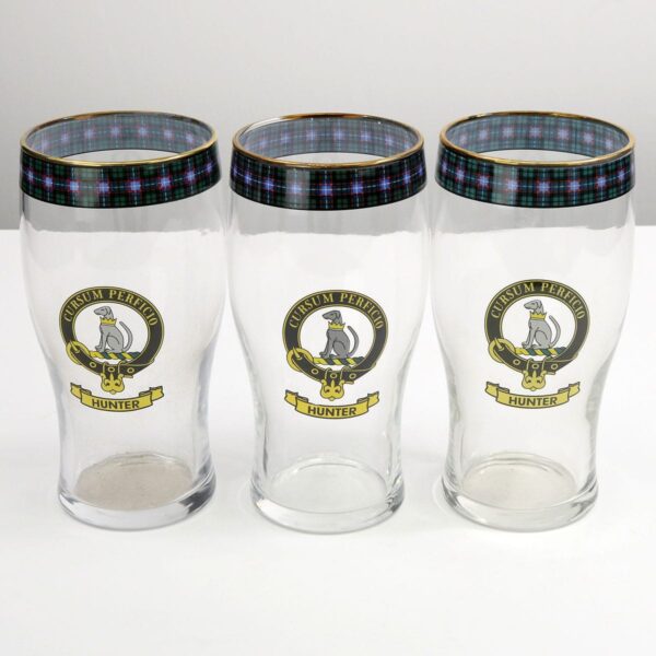 Three Hunter Clan Crest Tartan Pub Glasses - Set of 3 featuring the Hunter Clan crest.