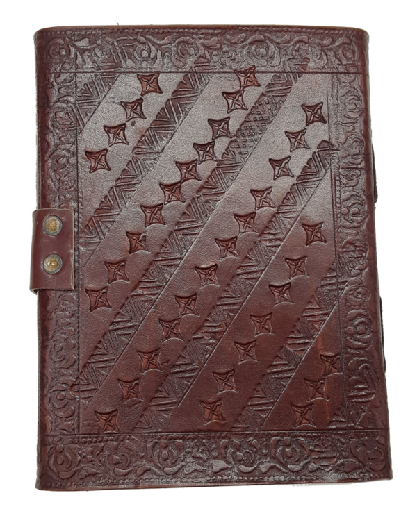 A brown leather journal with stars on it.