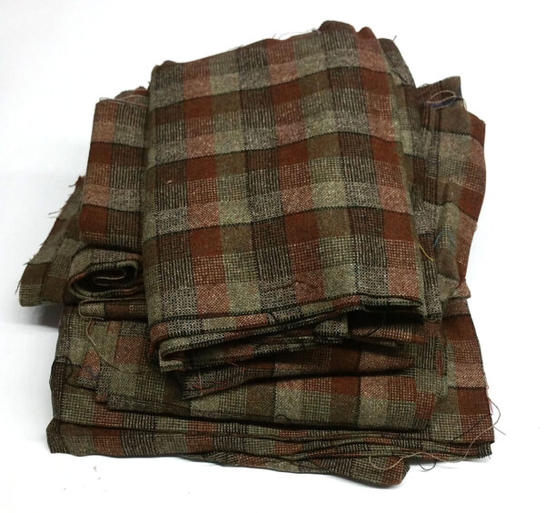 A pile of Braveheart Movie Tartan Craft Boxes, reminiscent of the movie Braveheart, on a white surface.