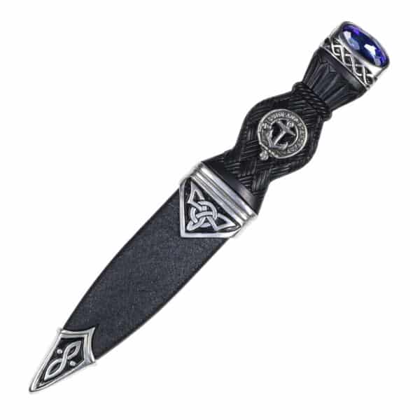 A silver Celtic Knot Clan Crest Sgian Dubh with a cross on it.