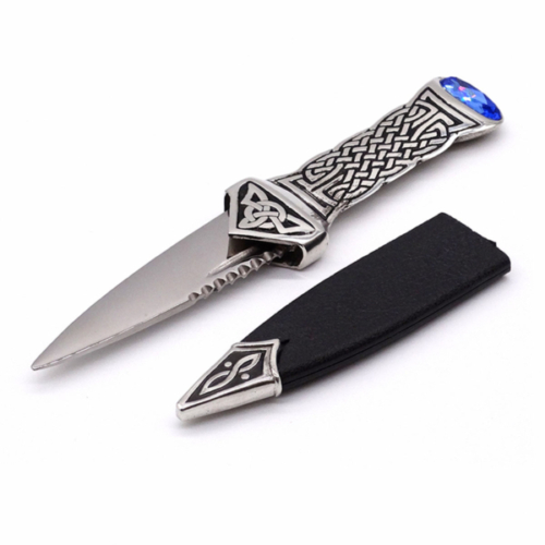 A silver Celtic Croft knife with a blue handle and a leather sheath.