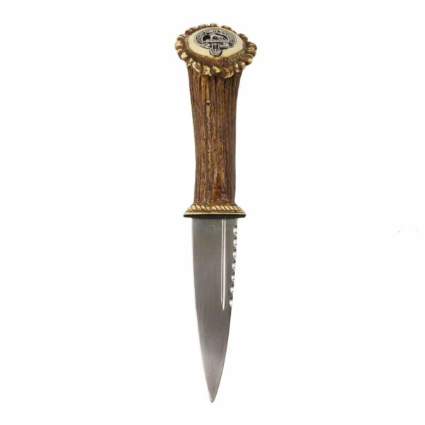 A Clan Crest Stag Handle Sgian Dubh with a gold handle on a white background.