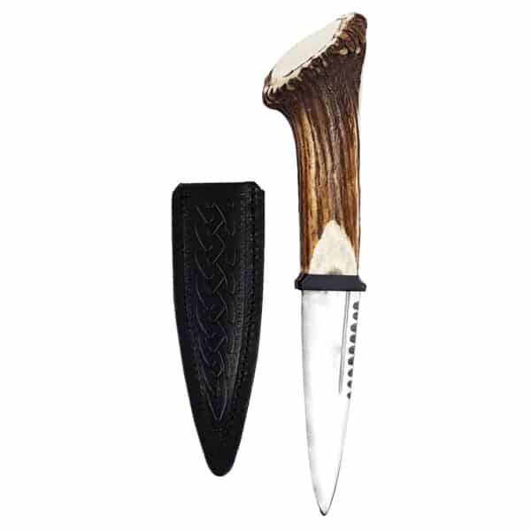 A Stag Crown Horn sgian dubh with a leather sheath.