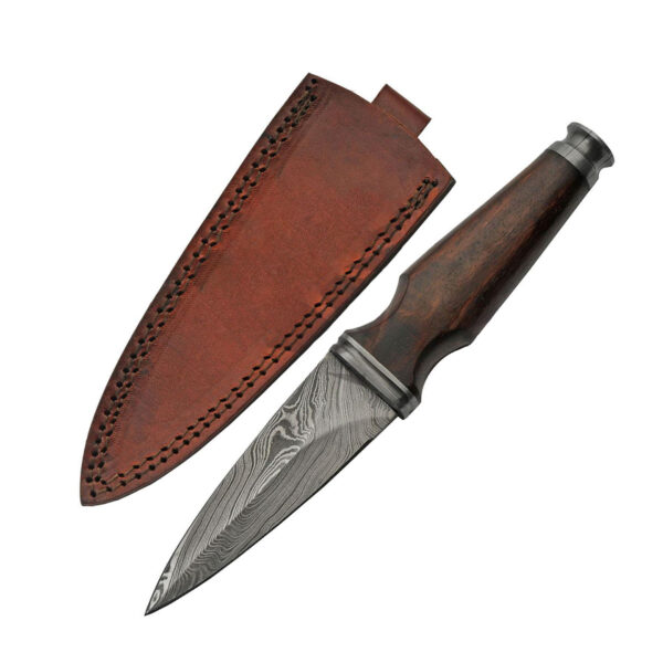 A Damascus Steel Sgian Achlais Ebony Wood Handle with an ebony wood handle, encased in a leather sheath, presented on a white background.