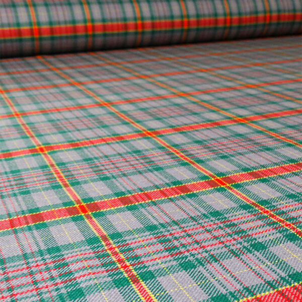 A Welsh Tartan Medium Weight Premium Wool - Double Width fabric on a table.