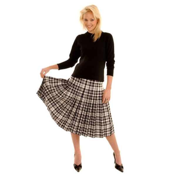 A woman wearing a Fiona Skirt Light Weight 11oz Premium Wool.