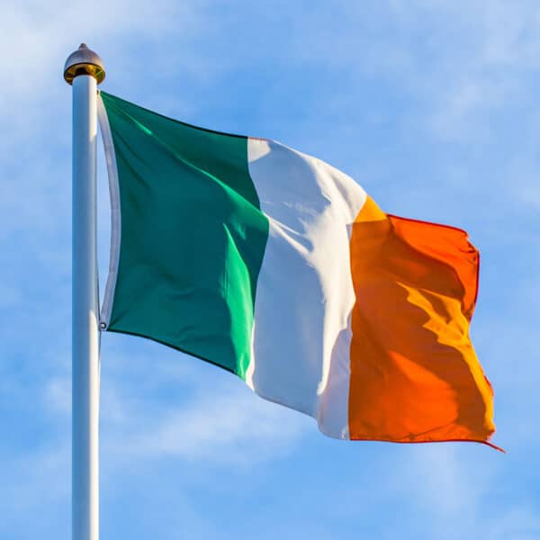 Irish flag flying in the wind.