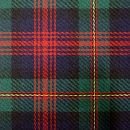 A close up of a green and red tartan fabric.