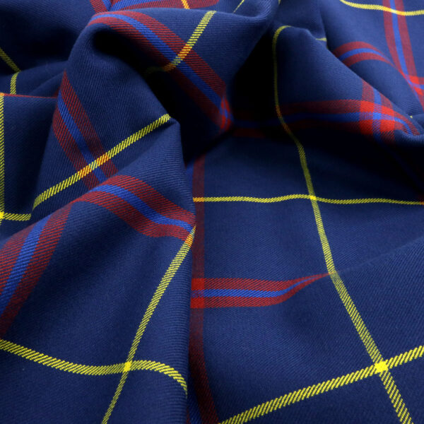 A close up of a blue and yellow plaid fabric.